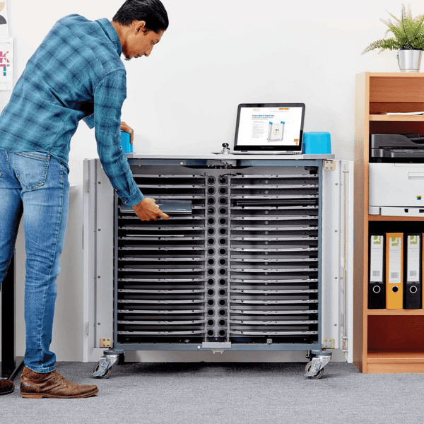 UniCabby 32 Horizontal Mobile Charging Trolley 3 Man taking laptop from Lapcabby mobile charging trolley